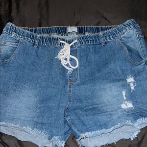 Blue Jean shorts. Brand is Gogo jeans. They have a little bit of stretch to them